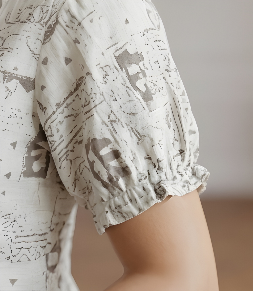Women's Abstract Print Off White Kurti.